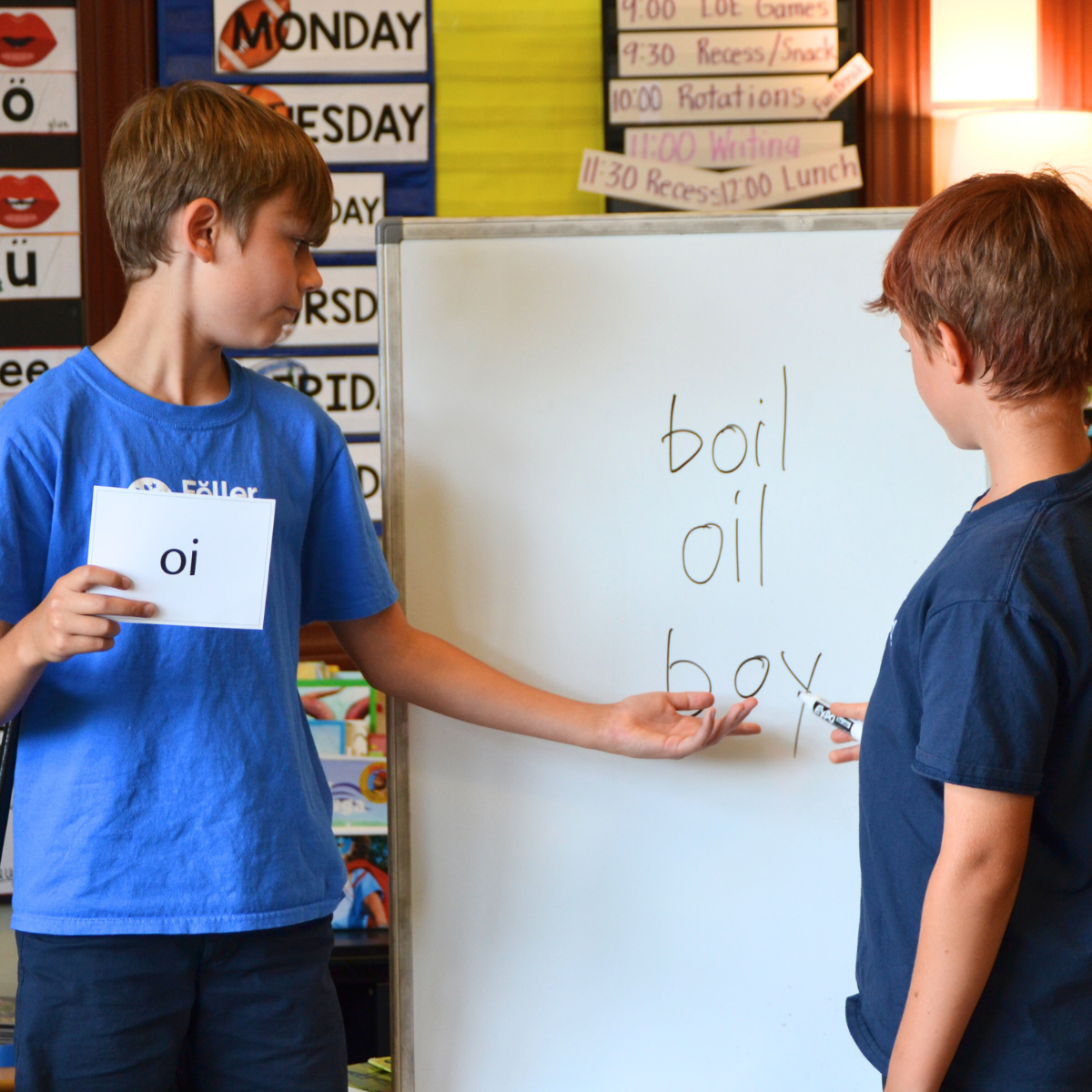 students explaining spelling rules