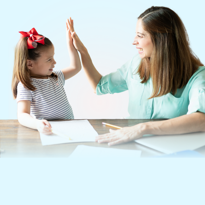 parent giving child high five