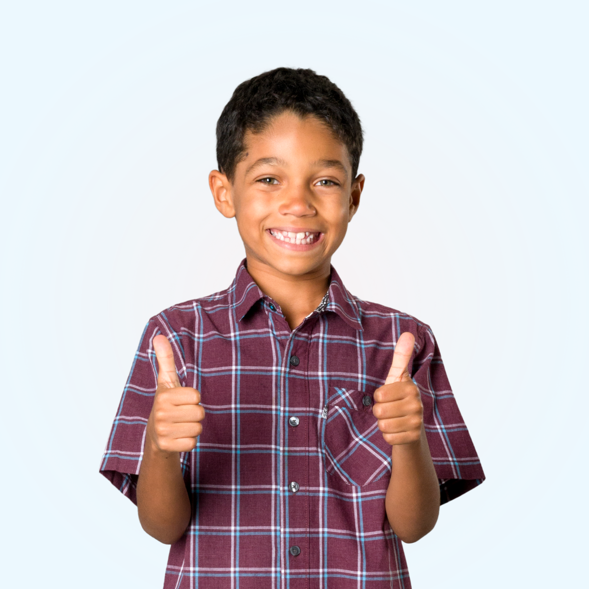 student with two thumbs up