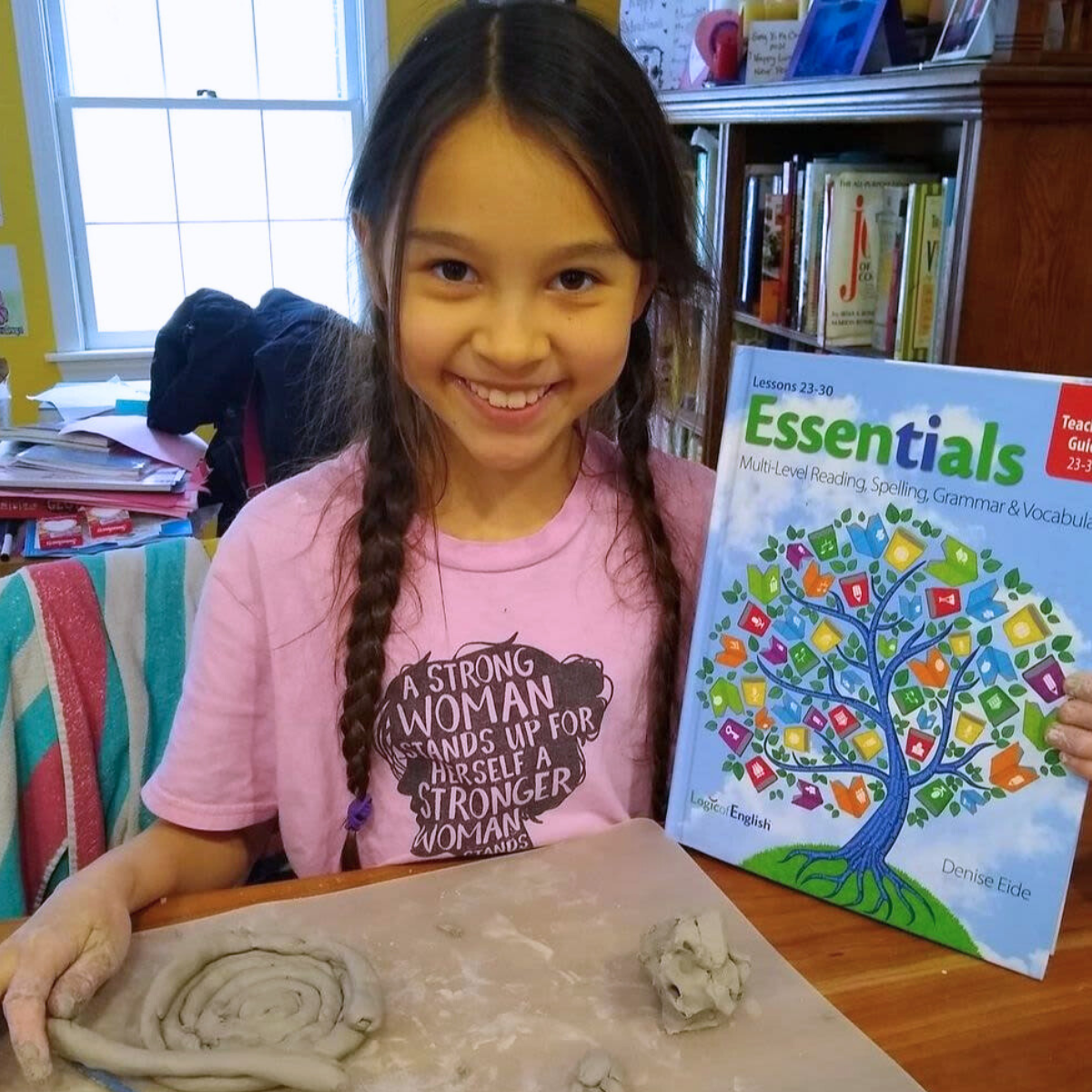 student with Essentials teacher's guide
