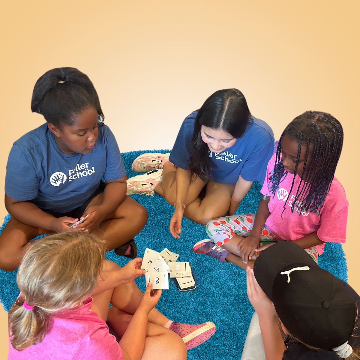 students playing phonogram card game