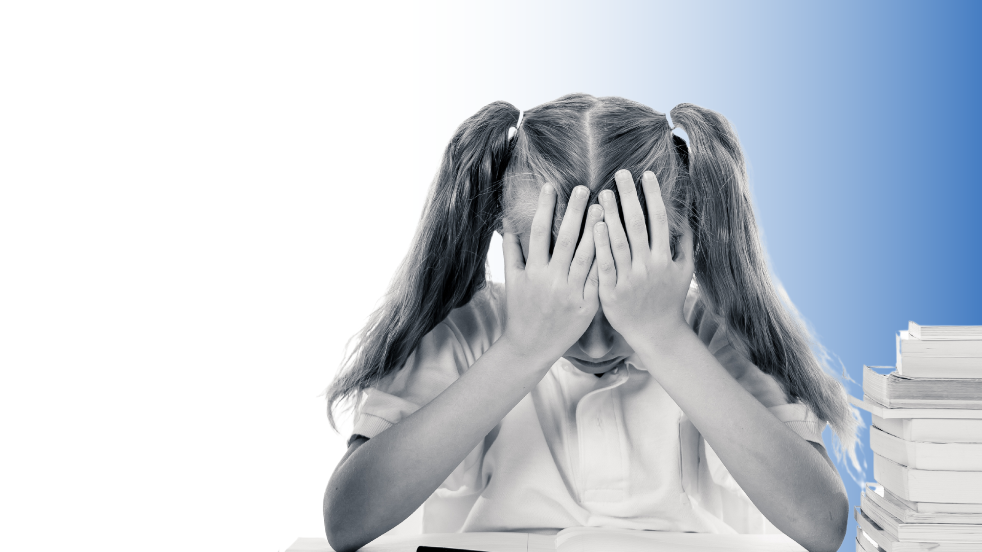 student with head in hands in disappointment