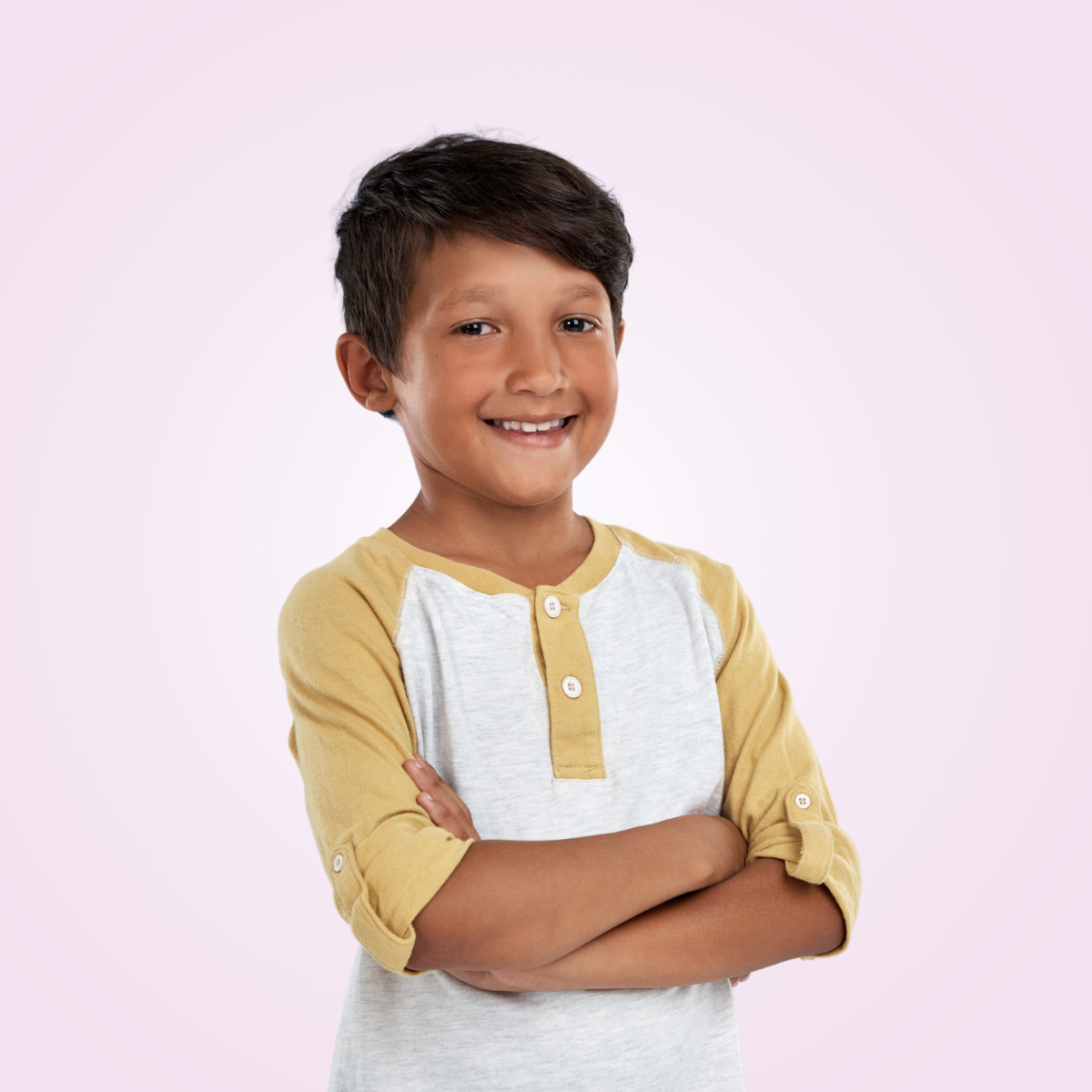 confident, young boy with arms crossed