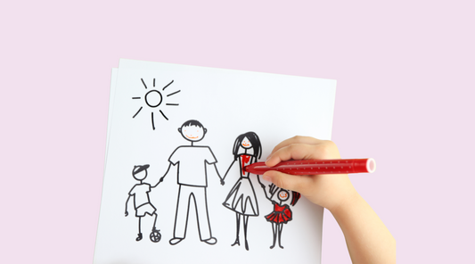 A student coloring a picture of a family