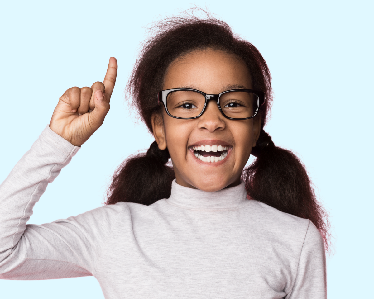happy child with index finger in the air